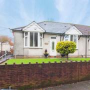 This bungalow in Caerphilly is perfect for a family with pets with a large garden and conservatory