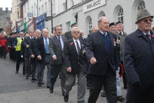 Veterans march towards the cenotaph at Chepstow on Sunday