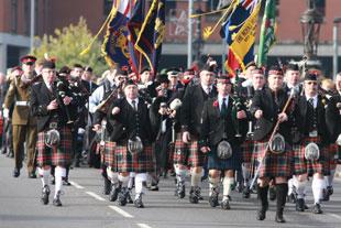 A Welsh pipe band at the Remembrance parade to the Cenotaph Clarence Place, Newport