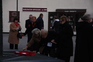 Wreaths are laid at the Caldicot sunset remembrance service