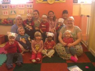 Staff and some of the children who have raised nearly £400 for children in need, from  Kites Nursery Newport, Queens Hill Crescent.