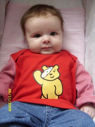 My little girl Eliza May Bailey who is 11 weeks old and showing her full support of Pudsey Bear and Children in Need in case you will be publishing pictures of people raising money for the cause!
 
Thanks,
 
Lorna Carnegie-Bailey