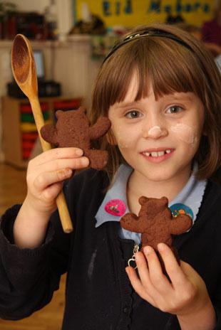 Children from Clytha Primary school Newport who made gingerbread people for the Children in Need  Abbie Melhuish with examples 
