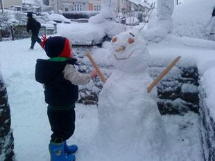 Here is a picture of my 23 month year old helping to build our snowman!
We would love to go and see Alvin and Chipmonks in the cinema!
Regards,Tammy Moran.