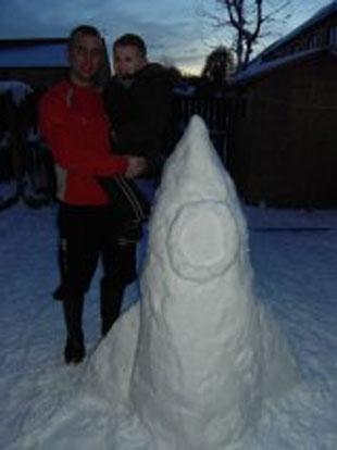 Chris, Hannah and Tyler help made snow rocket. Chris Haddock.