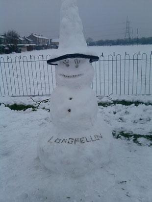 Heres a our snowman in 

longfellow road park Caldicot 

built this morning by myself 

Keren and Rich. He is Mr Cone 

Head