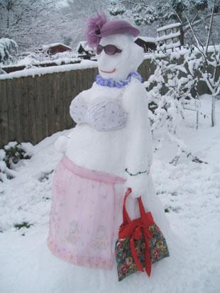 Attatched are two photographs of two snow people made by myself yesterday in my garden.
Snowlady is in the back garden - I had to borrow the bra, mine was too small,
and The Original Snowman is out the front.
Natalie Moxham