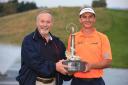 WINNER: Joost Luiten holds the trophy after winning the 2014 Wales Open with owner of Celtic Manor Sir Terry Matthews