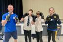 The coaches work with the children on non-contact boxing