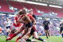 England's Ellie Kildunne scores her side's eighth try against Wales