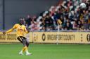 PING: Nelson Sanca puts the ball forward on his Newport County debut
