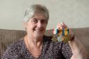 Robert Phillips fought in the trenches in WW1. Pictured is grand daughter Lynda Osbourne with her grandfather's medals. (9443007)