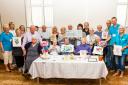 TRIBUTE: Staff and members of the Alzheimer’s Society craft group in Blackwood with Mr Davies’ wife, Dorothy, and daughter, Cheryl