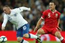 INTERNATIONAL: Darcy Blake in action against Wayne Rooney at Wembley in 2011