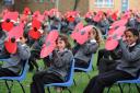 Students from Duffryn High form 1914 - 1918 2015 with giant poppies to mark the launch of Gwent County Royal British Legion Poppy appeal 2105. (43272372)