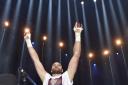 Britain's Tyson Fury celebrates after winning in a world heavyweight title fight for Ukraine's Wladimir Klitschko's WBA, IBF, WBO and  IBO belts in the Esprit Arena in Duesseldorf, western Germany, Sunday, Nov. 29, 2015. (AP Photo/Martin Meissner).