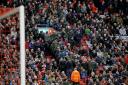 PRICE PROTEST: Liverpool fans walk out after 77 minutes of the Barclays Premier League match against Sunderland at Anfield