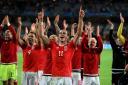 Wales celebrate with their fans