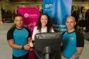 Gemma Carter from St David's Hospice Care gets a training session from general manager Simon Pope (left) and assistant general manager David Smith, as The Gym plan to cover 125 miles in aid of St David's `Hospice Care