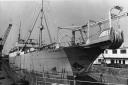 CABLE-LAYER: The John W Mackay in dry dock at Newport