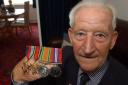 HONOURS: Bob Curzon with his medals earned during the Second World War