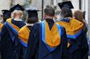 File photo dated 12/10/11 of students wearing Mortar Boards and Gowns after graduating. Teenagers in some parts of England are up to 18 times more likely to go to university than their peers in other areas, a study suggests.  PRESS ASSOCIATION Photo.