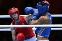 BRAVE IN DEFEAT: Fred Evans takes the fight to Serik Sapiyev
