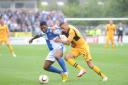 SEVERNSIDE DERBY: Christian Jolley tackles Ellis Harrison in our win over Bristol Rovers in August