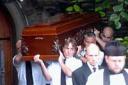 FINAL JOURNEY: The coffin of Darren Ayland is taken from St Stephens church in Pill