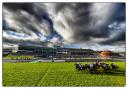 CHEPSTOW, WALES - DECEMBER 27: (EDITORS NOTE: This image was processed using digital filters) A general view as runners pass the grandstands at Chepstow racecourse on December 27, 2014 in Chepstow, Wales. (Photo by Alan Crowhurst/Getty Images).