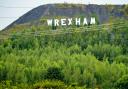 The Hollywood-style sign above Wrexham. Picture: Peter Byrne/PA Wire