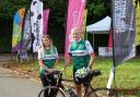 Tania Ansell, of St David's Hospice Care, and Martin Atkinson at the start of the Tour de Gwent 2022. Picture: DBPR