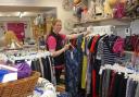 Emma Hacker, shop manager, makes sure everything looks tidy. Picture: DBPR