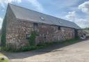 Idyllic: This barn in the Monmouthshire village of Llanellen, near Abergavenny,  being sold by Paul Fosh Auctions, has planning permission for conversion to a pair of houses