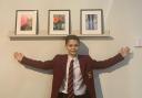 Dante with his pictures at a Monmouth gallery