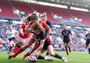 England's Ellie Kildunne scores her side's eighth try against Wales