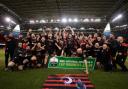 WINNERS: Newport Saracens lift the Division Four Cup at Principality Stadium