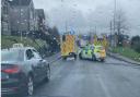 Emergency services at crash scene as road closed