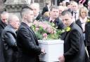 FAREWELL: Nikitta Grender’s coffin is carried from St Andrew’s Church