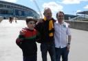 WEMBLEY WAY: Newport AM John Griffiths at Wembley last year with his son and grandson