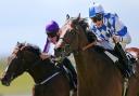 Al Kazeem under jockey James Doyle (right) beats Camelot in the Tattersalls Gold Cup at the Curragh