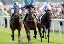 Declaration of War ridden by Joseph O'Brien (centre) beats Al Kazeem ridden by James Doyle (left) and Trading Leather ridden by Kevin Manning to win the Juddmonte International Stakes (PA Wire)