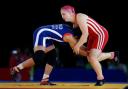 NO MEDAL: Welsh wrestler Sarah Connolly, right, was beaten by Cameroon's Blessing Oborududu