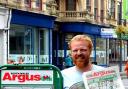 READ ALL ABOUT IT Newport newsagent opwner Jon Powell who hopes to sell the Argus at the NATO Summit