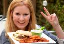 Argus reporter Fran Gillett with the 'peace burger'