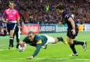 South Africa's Bryan Habana skips past USA's Niko Kruger (right) to score his hat-trick try during the World Cup match at the Olympic Stadium, London. PRESS ASSOCIATION Photo. Picture date: Wednesday October 7, 2015. See PA story RUGBYU South Africa.
