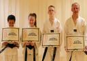 PROUD: Torfaen Taekwondo Club's latest black belts