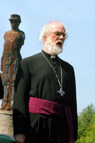 The Archbishop of Canterbury Dr Rowan Williams in front of the memorial.