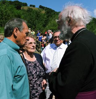 Nancy Presdee of Nantyglo who lost a brother, George Crandon and George's son, Don meet the Archbishop of Canterbury Dr Rowan Williams.
