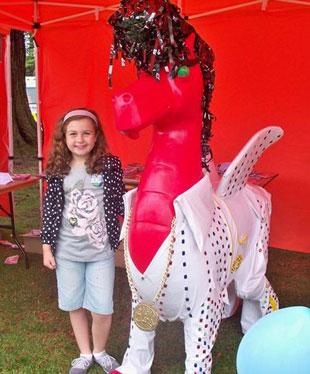 This is my daughter Maddsion Age 8 from Lliswerry Primary School checking out Number 31 Superdragon - Elvis. From Gemma Boucher.